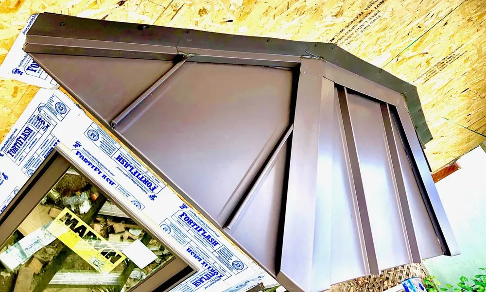 Slide of Economy Roofing