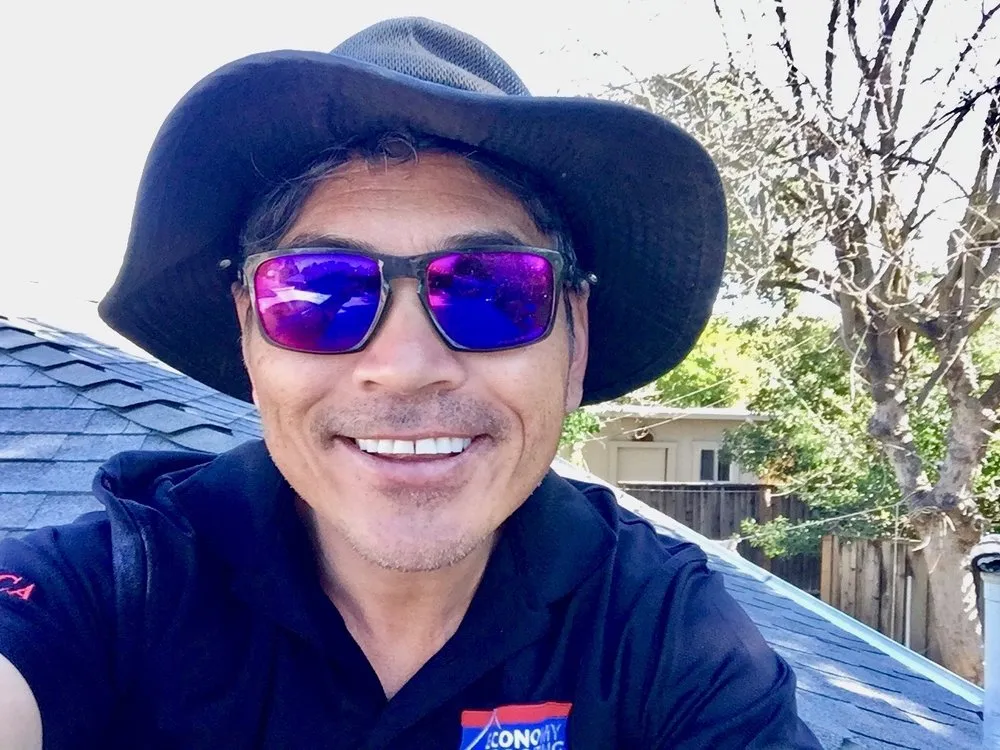 Slide of Economy Roofing