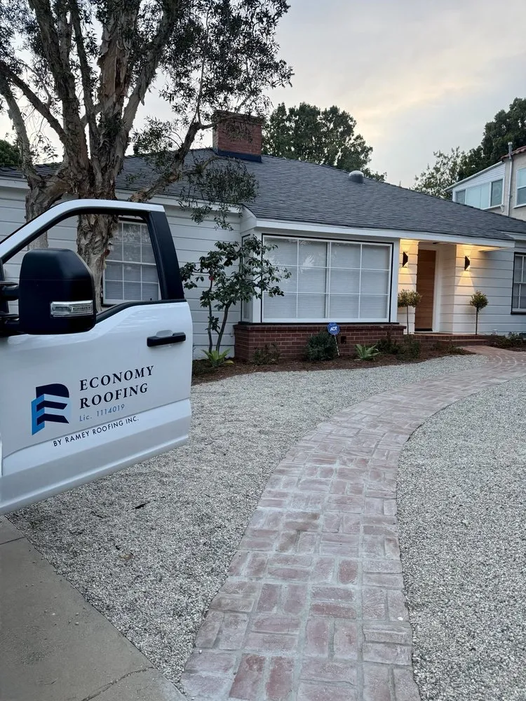 Slide of Economy Roofing