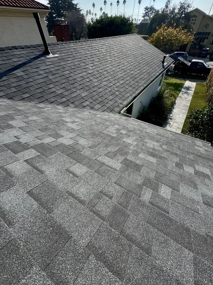 Slide of Economy Roofing