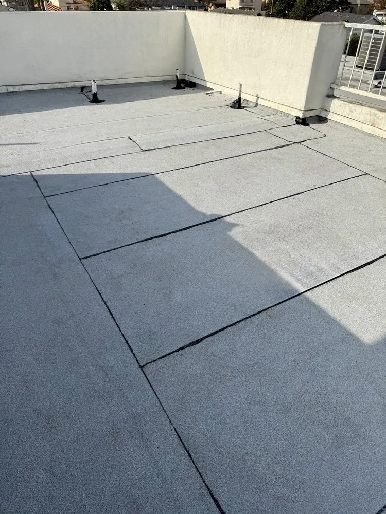 Slide of Economy Roofing