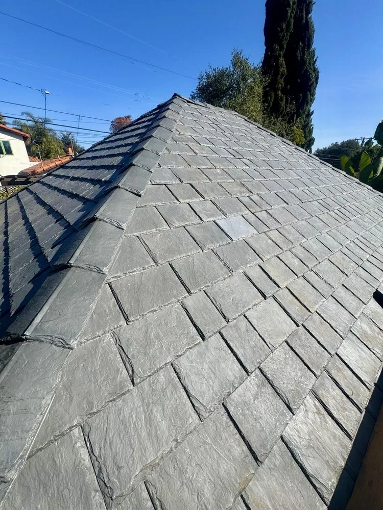 Slide of Economy Roofing