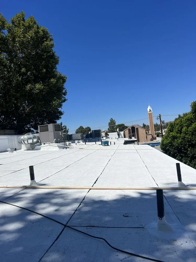 Trusted flat roof repair after storm damage in Tarzana, CA by Ecostar Group