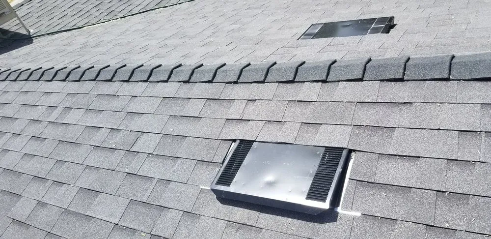 Slide of Ed and J United Roofing