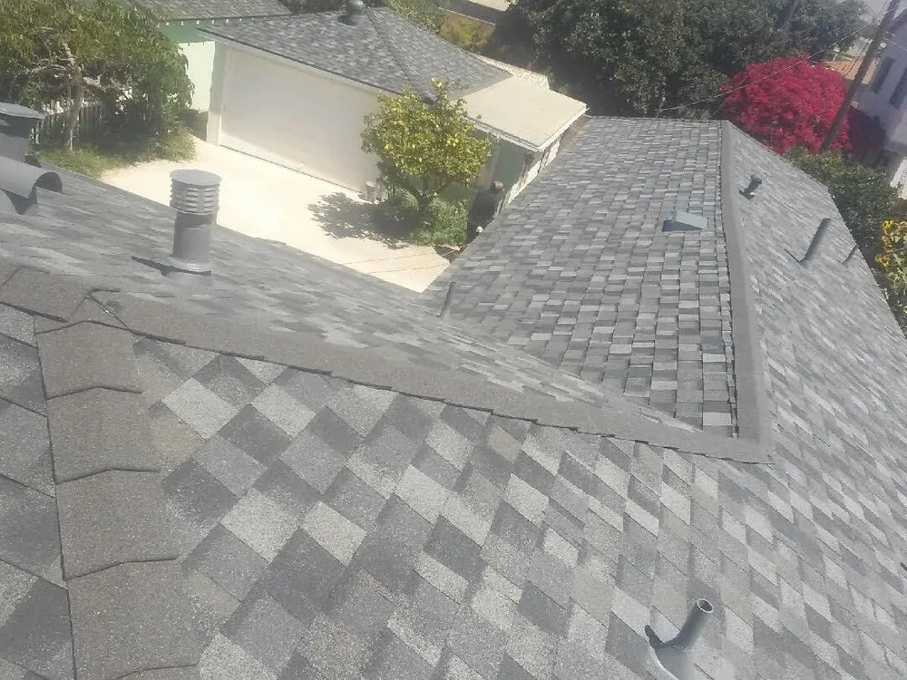 Slide of Eddies Roofing