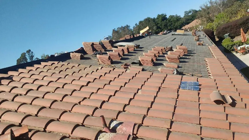 Slide of Eddies Roofing