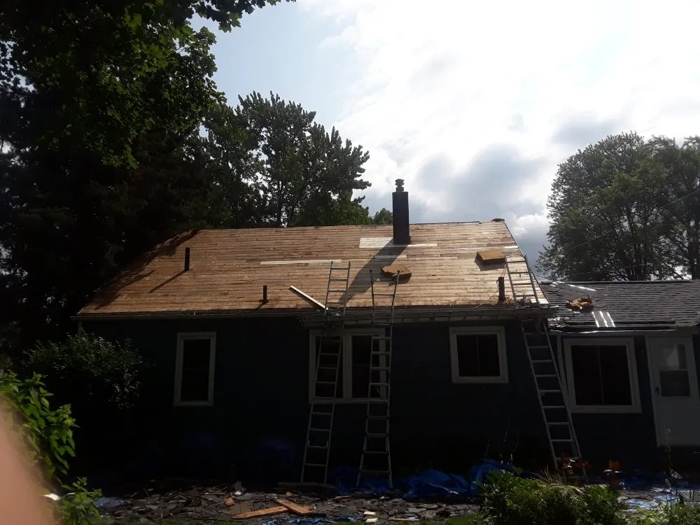 Slide of Edge To Edge Roofing