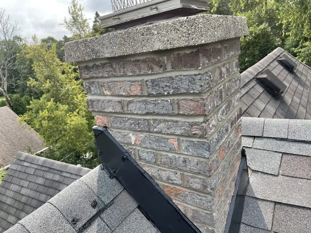 Slide of Ed's Chimney Flashing Roofing & Repairs