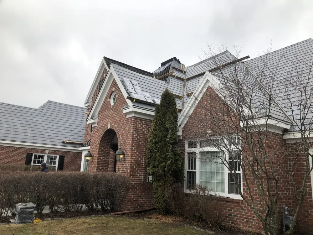 Slide of Ed's Chimney Flashing Roofing & Repairs