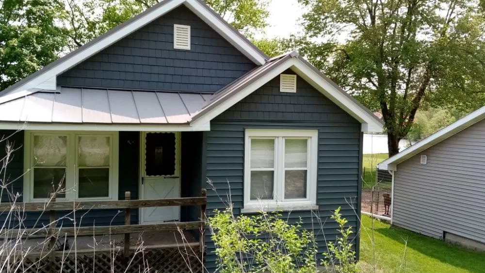 Expert residential roofing service after storm damage across Colon, MI - Ed's Construction