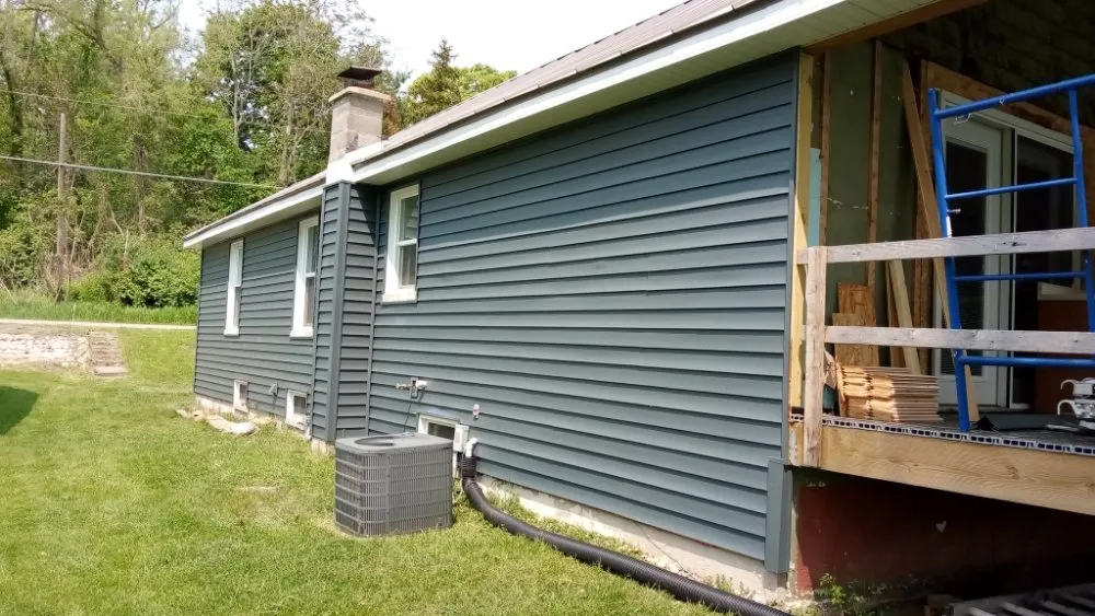 Licensed storm damage roof repair for fast service in Colon, MI by Ed's Construction