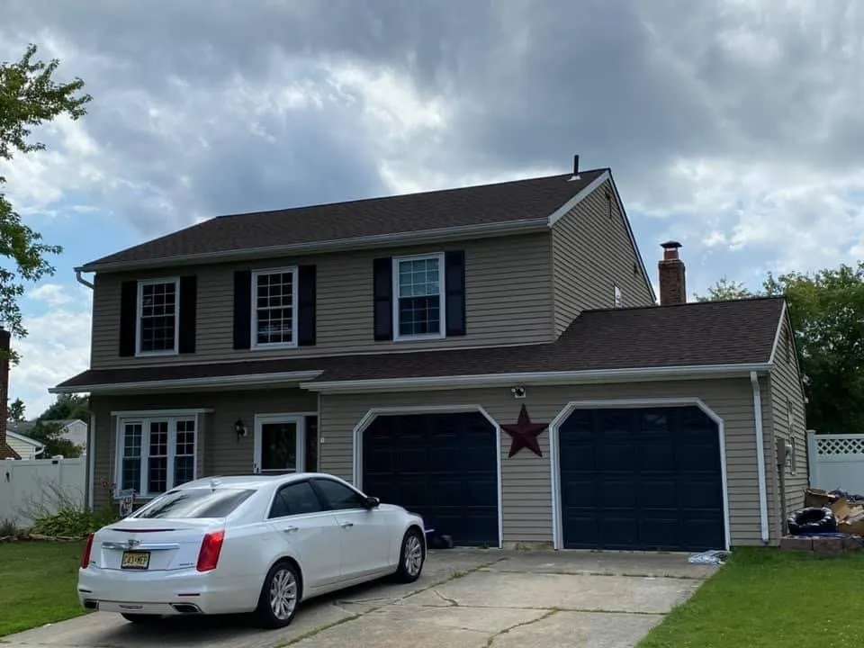 Slide of Ed's Roofing & Siding