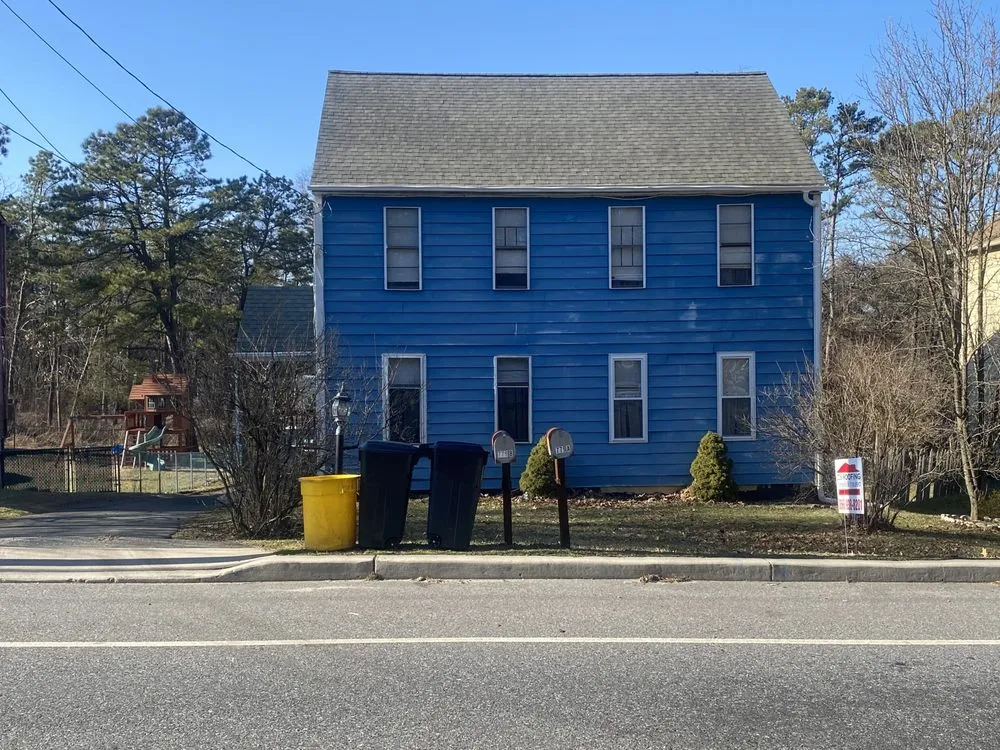 Slide of Ed's Roofing & Siding