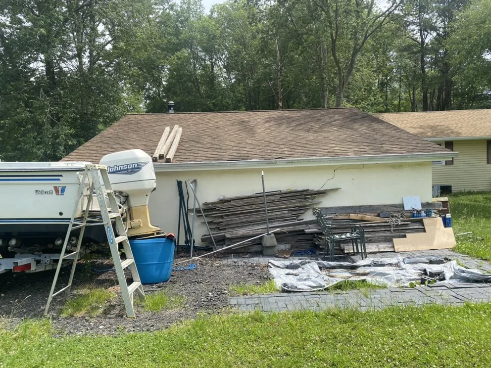 Slide of Ed's Roofing & Siding