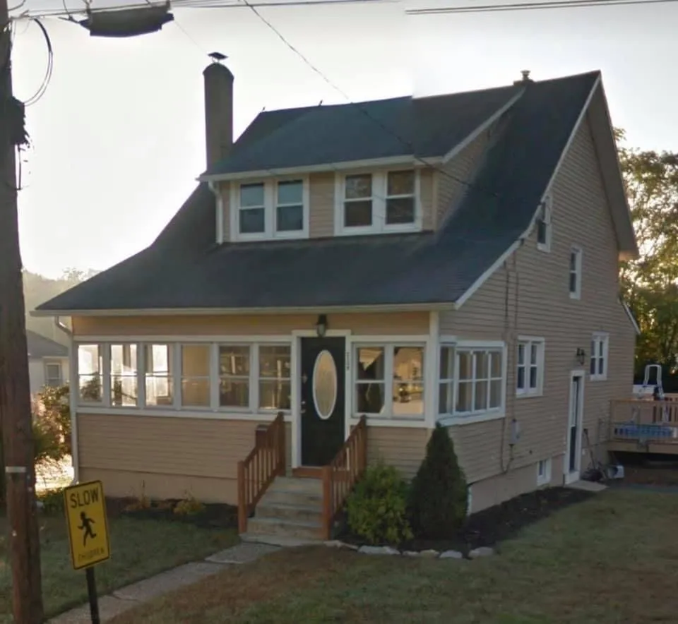 Slide of Ed's Roofing & Siding