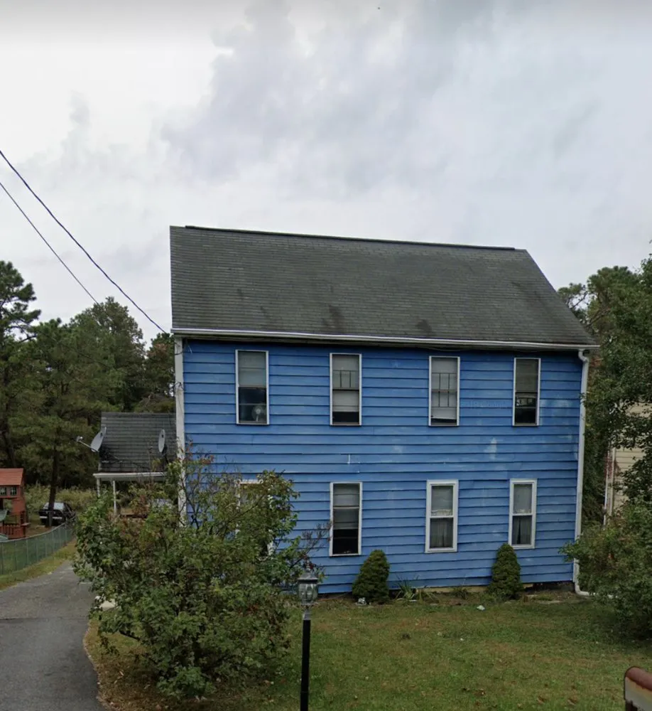 Slide of Ed's Roofing & Siding