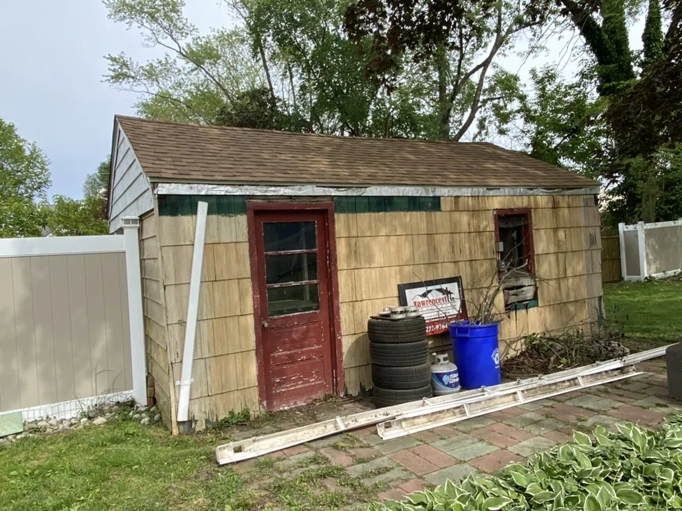 Slide of Ed's Roofing & Siding