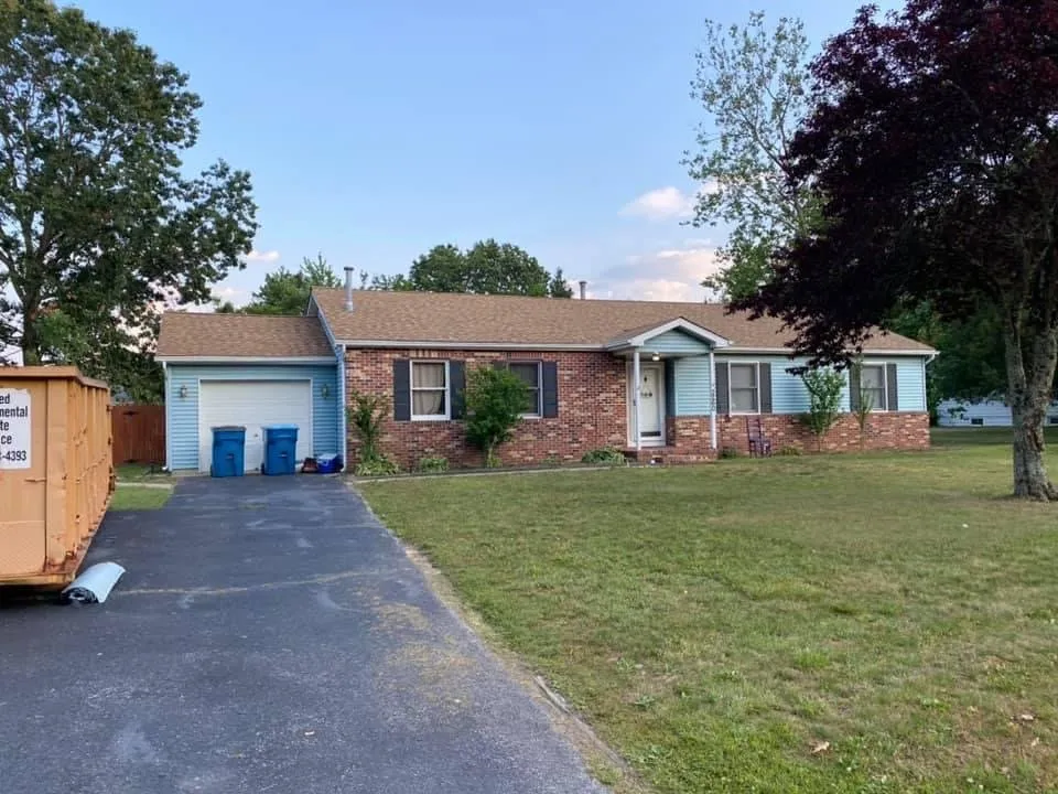 Slide of Ed's Roofing & Siding