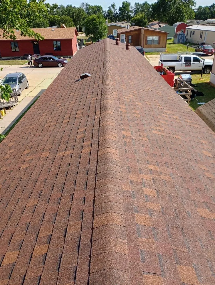 Slide of Eds Roofing