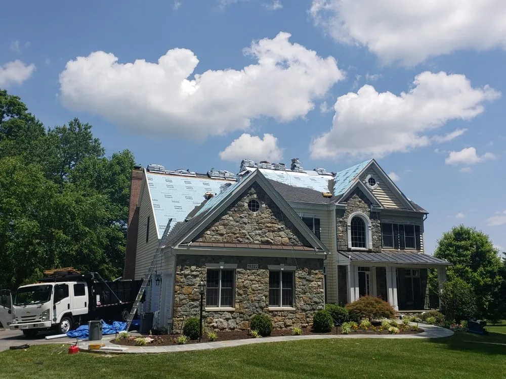 Slide of EDU Roofing Company