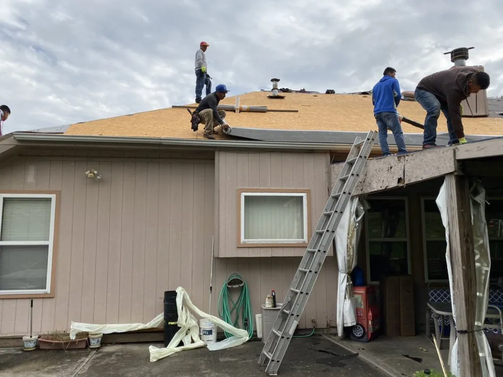 Slide of Edward L Clary Roofing