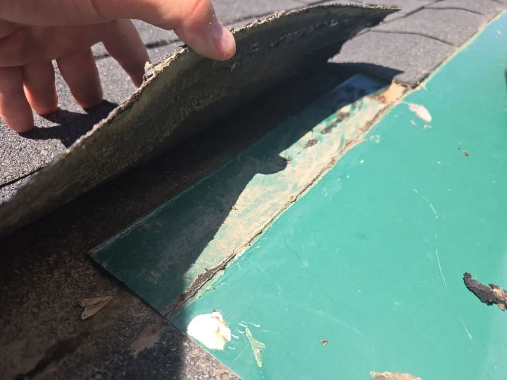 Slide of Edwards Roofing Repair