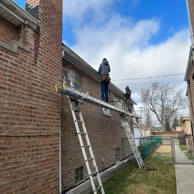 Edwin's Roofing and Gutters Logo