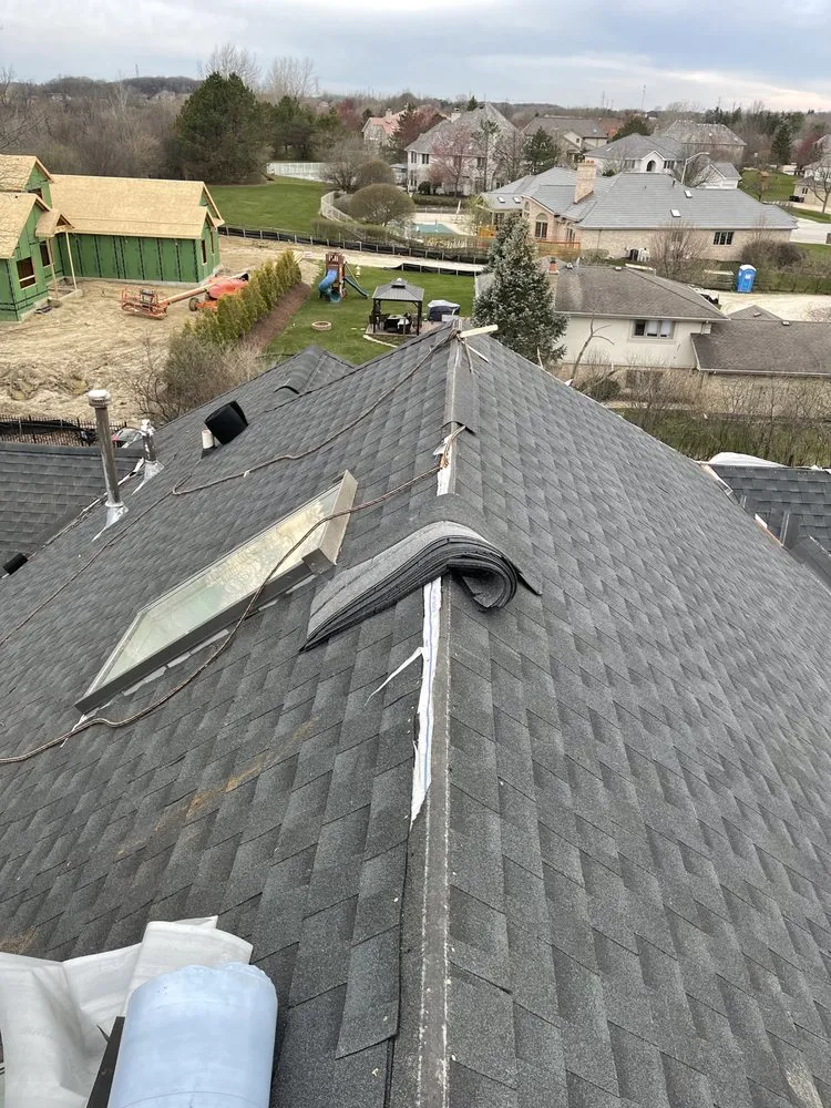 Slide of E&E Roofing