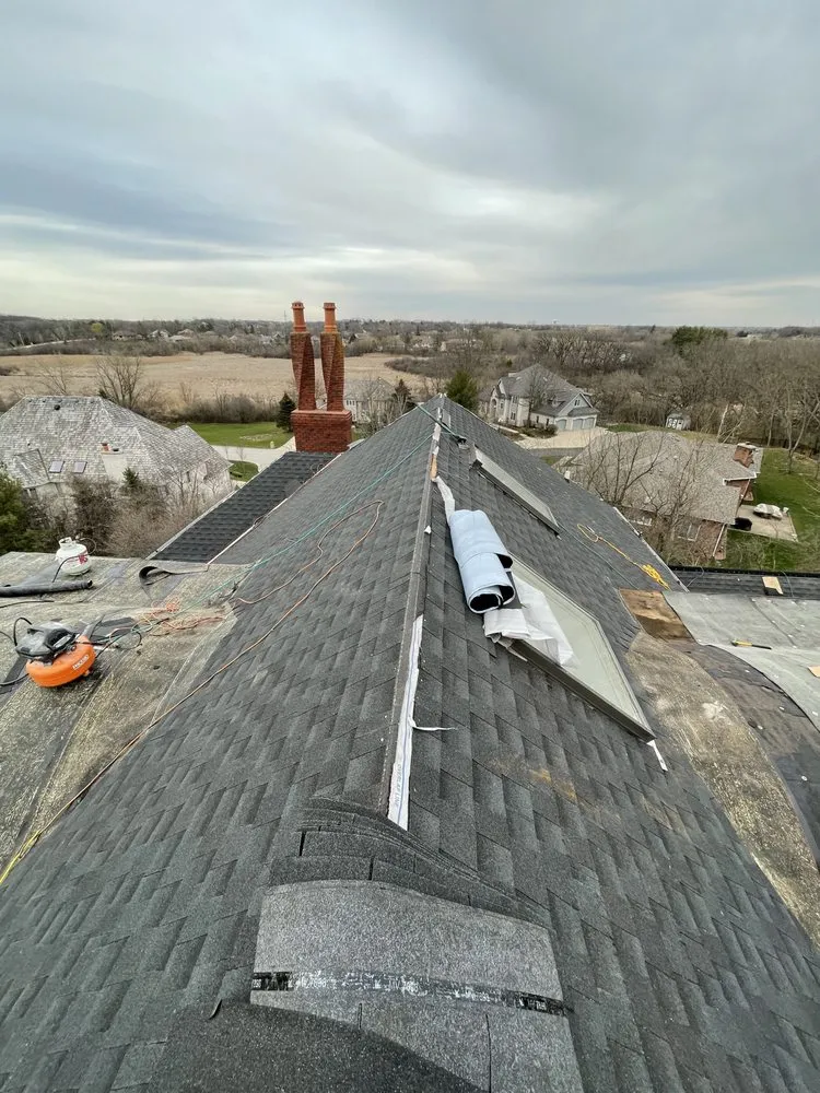 Slide of E&E Roofing