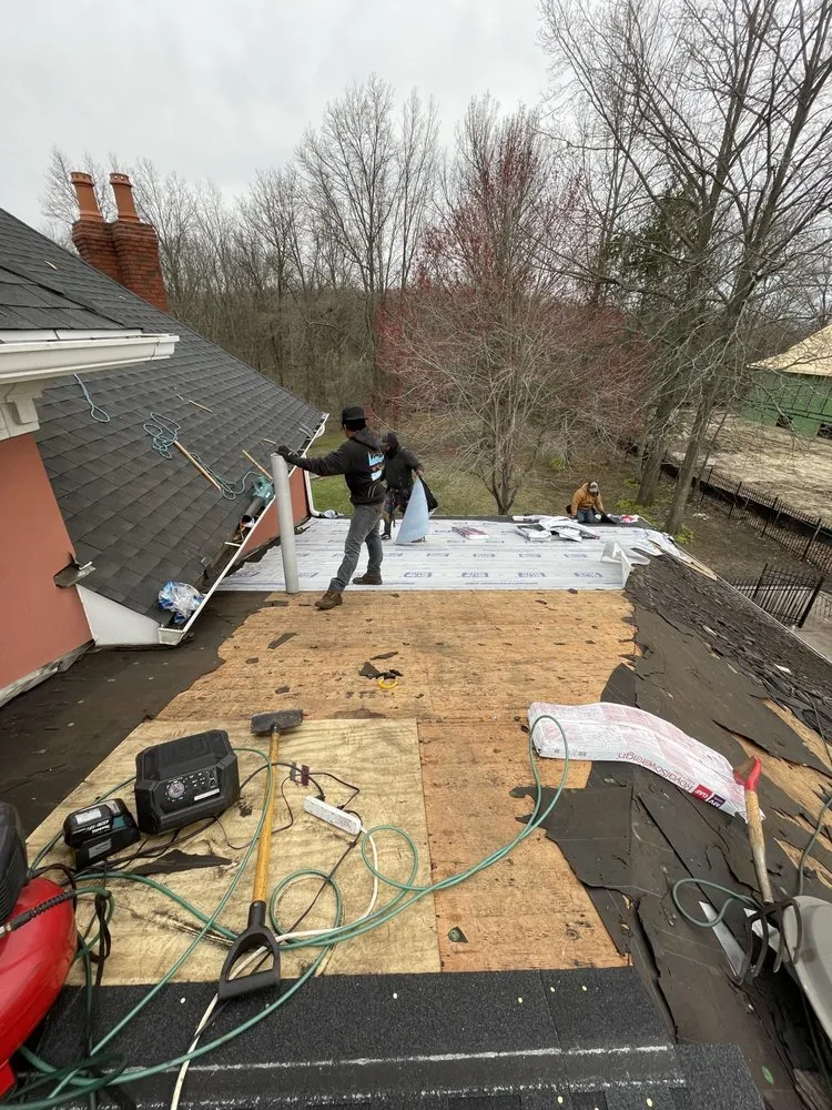 Slide of E&E Roofing