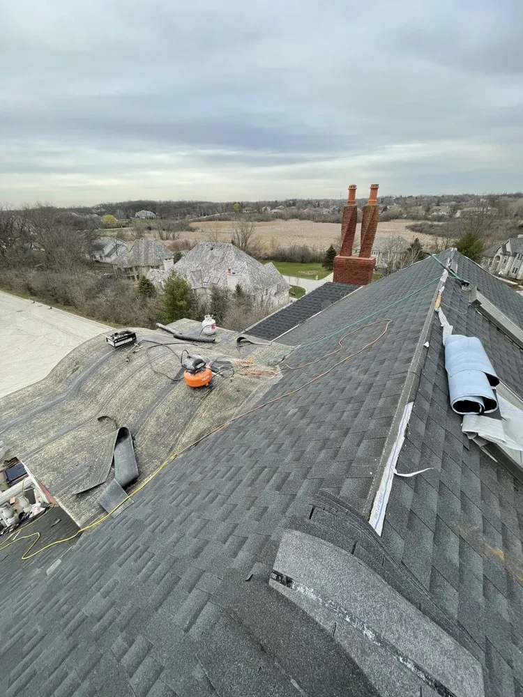 Slide of E&E Roofing