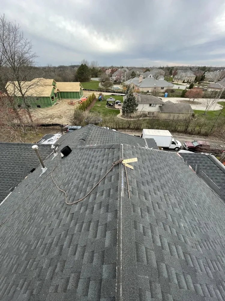 Slide of E&E Roofing