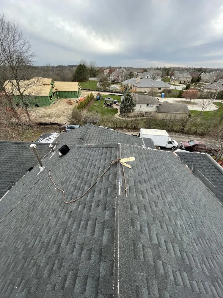 Slide of E&E Roofing