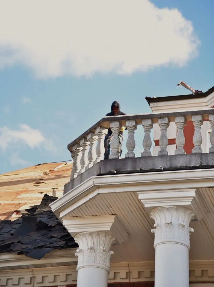 Slide of E&E Roofing