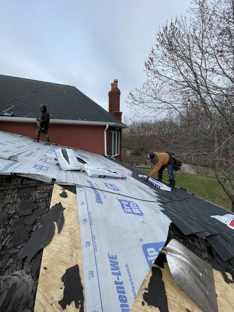 Slide of E&E Roofing