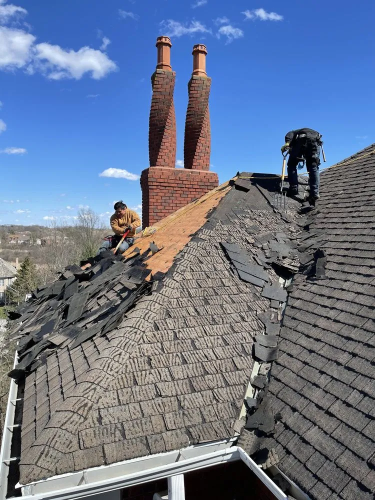 Slide of E&E Roofing