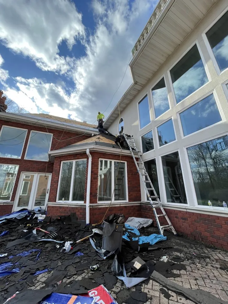 Slide of E&E Roofing