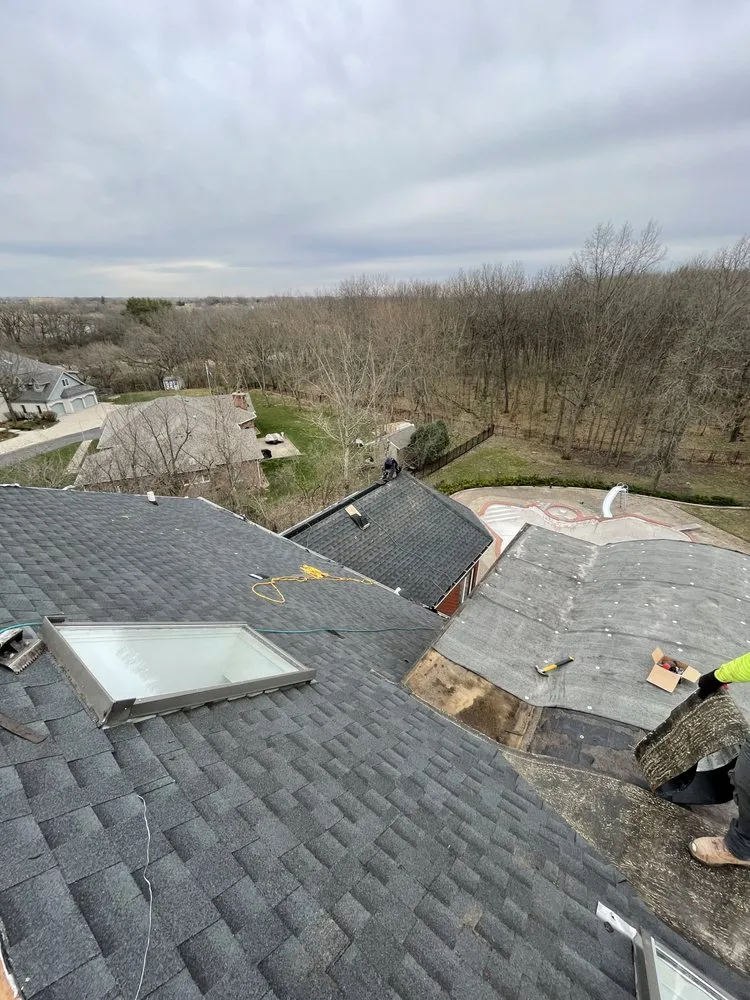 Slide of E&E Roofing