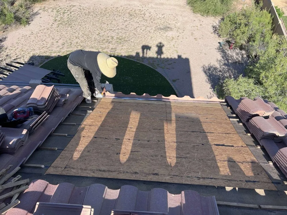 Slide of E&E Roofing