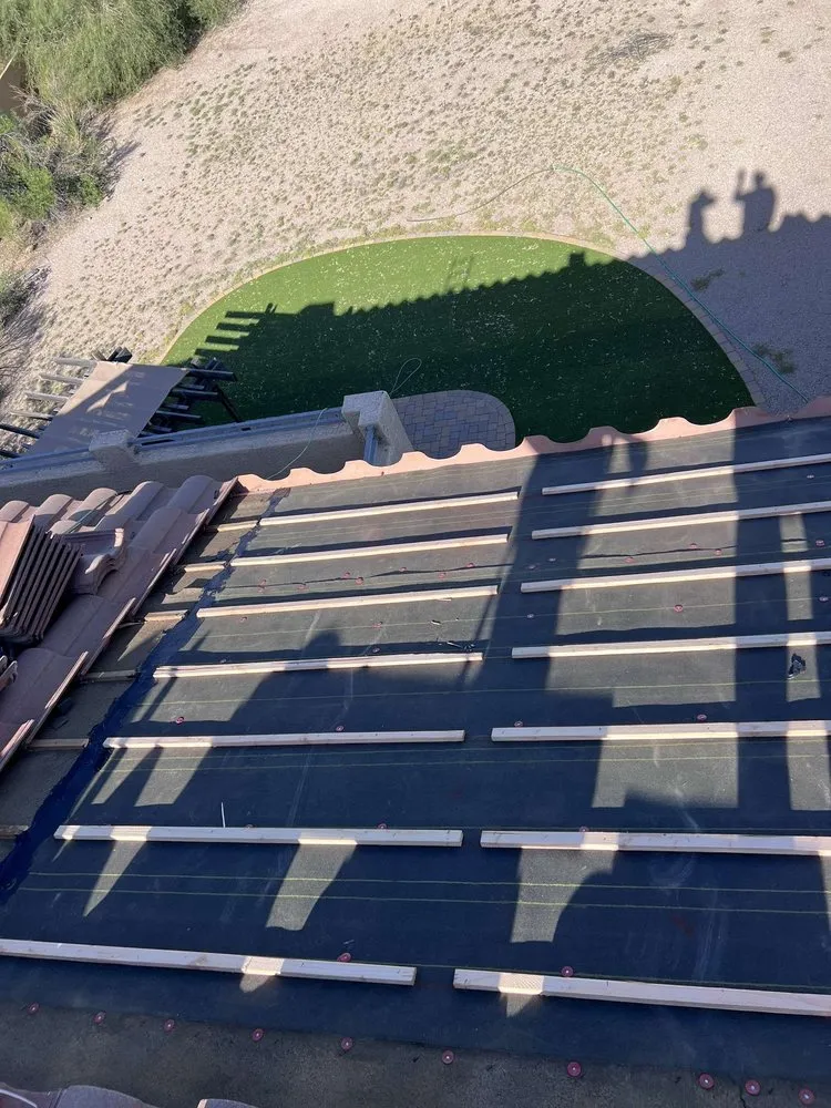 Slide of E&E Roofing