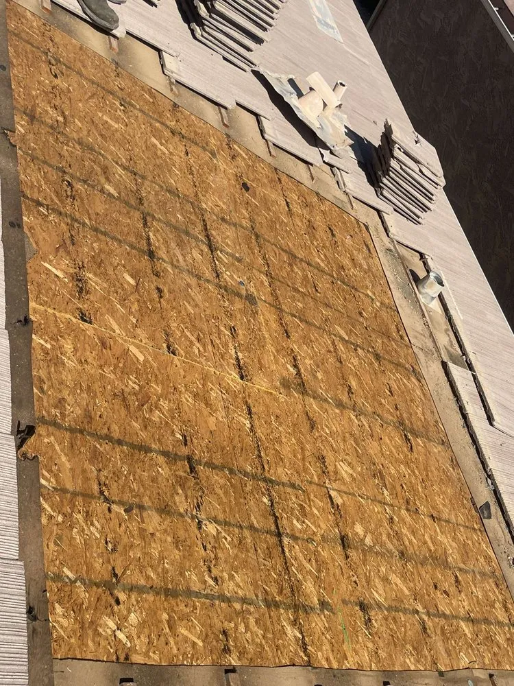 Slide of E&E Roofing