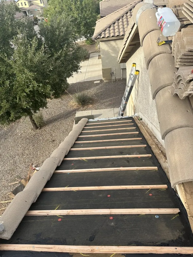 Slide of E&E Roofing