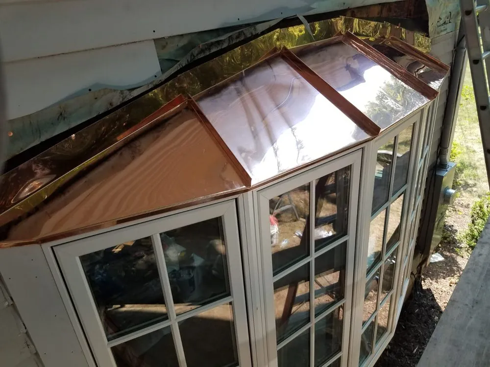 Slide of E&F Roofing