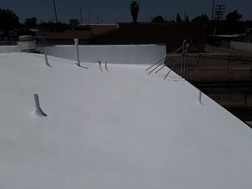 Slide of Efrain Zepeda's Rainbow Roofing