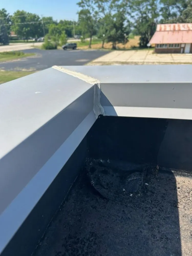 Slide of EG Flat Roof Leak Specialist
