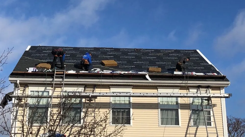 Slide of Egama Roofing