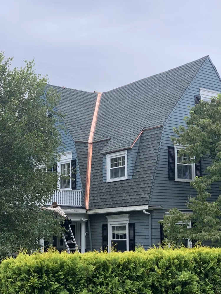 Slide of Egama Roofing