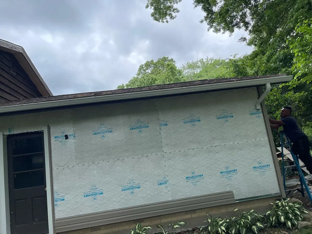 Slide of EGC Roofing and Siding