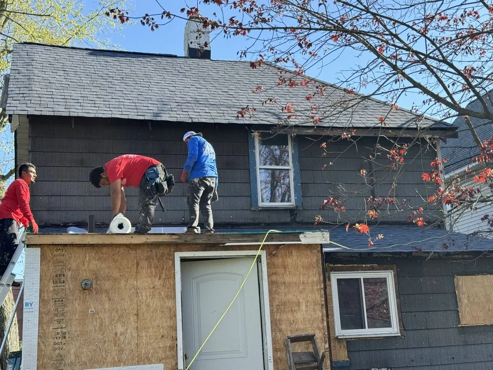 Slide of EGC Roofing and Siding