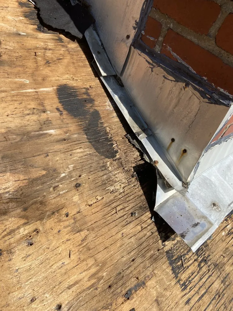 Slide of E.H. Roofing